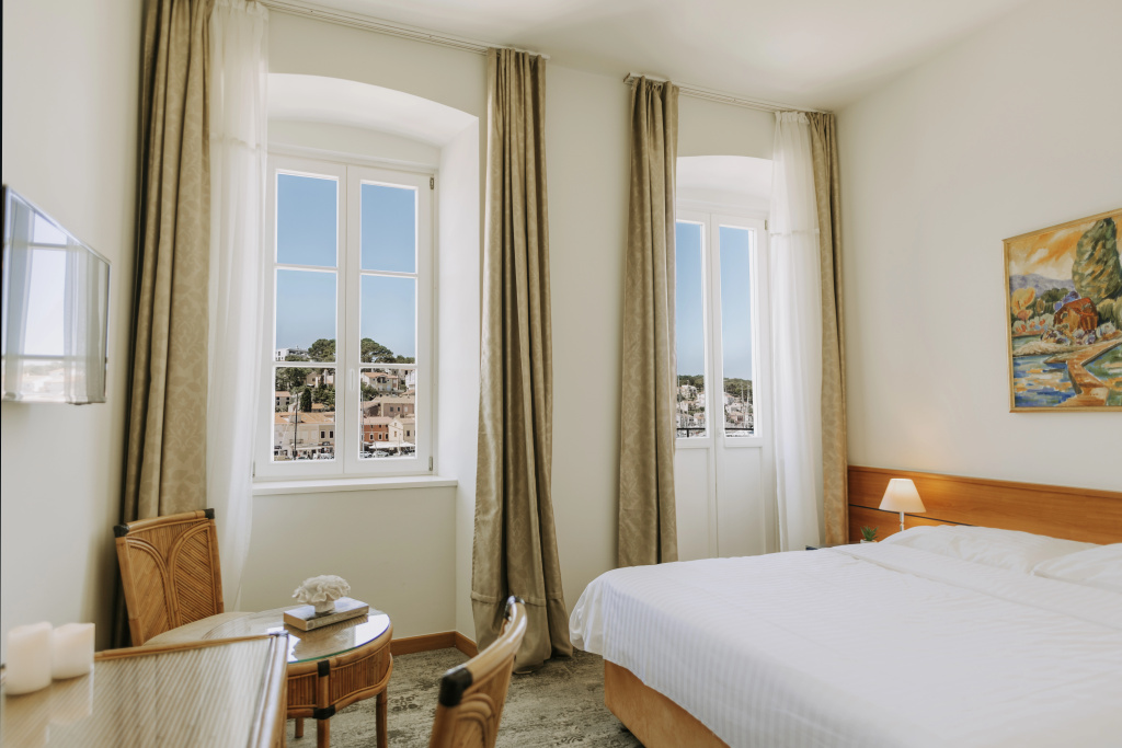 Apoksiomen Hotel - Chambres