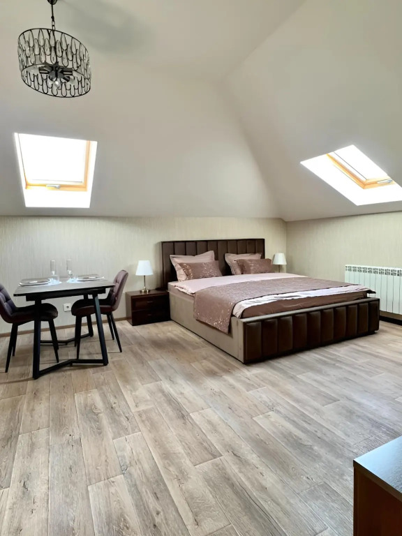 Студия Мансарда в Eva Apartments