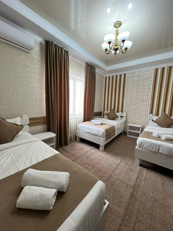 Kausar. Hotel - Chambres