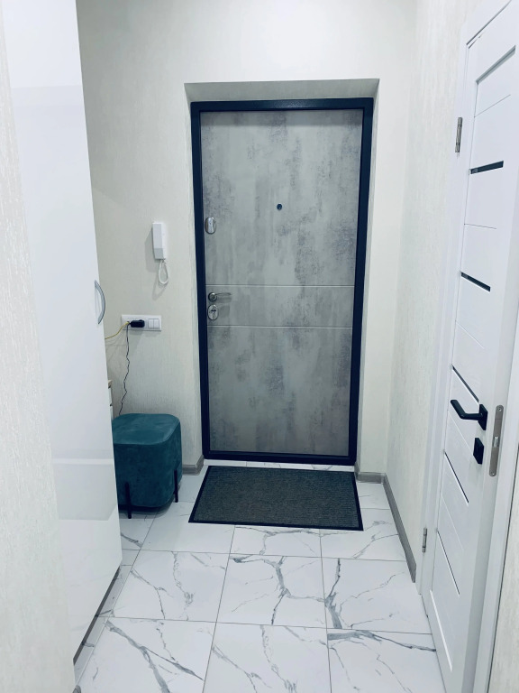 Квартира Уютная студия с панорамными окнами - фото 15