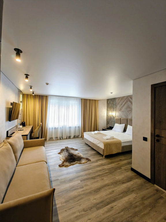 Tash Maral Hotel Room Type - Deluxe Triple room with view
