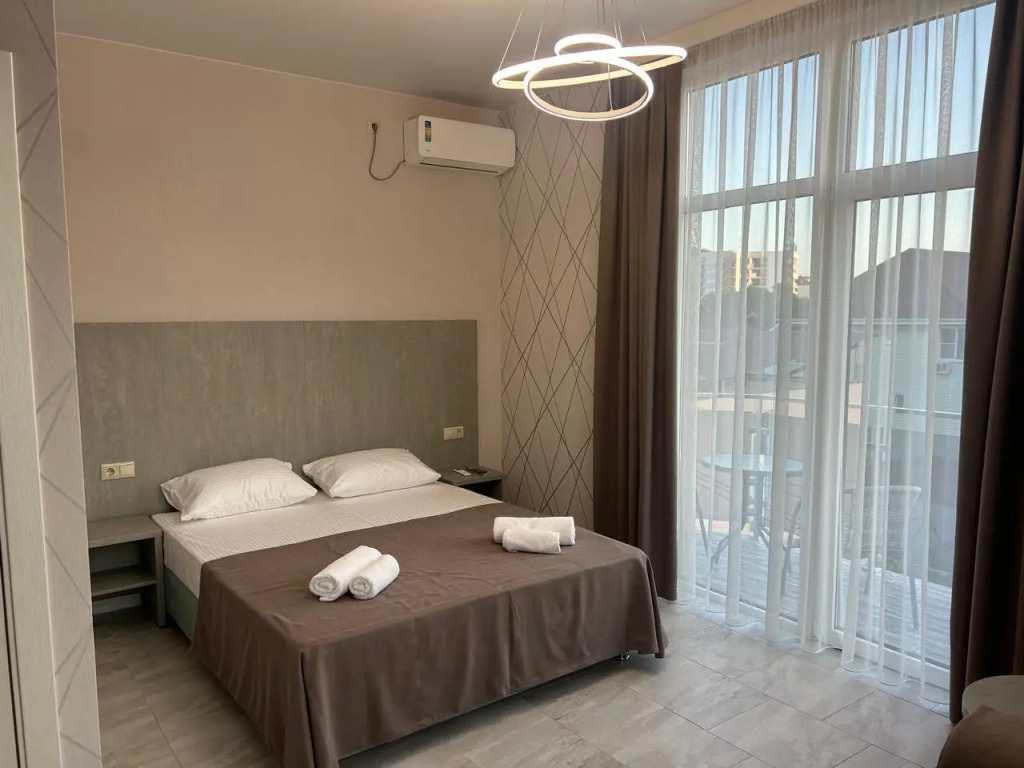 Четырёхместный номер Standard с балконом в Сюзэн