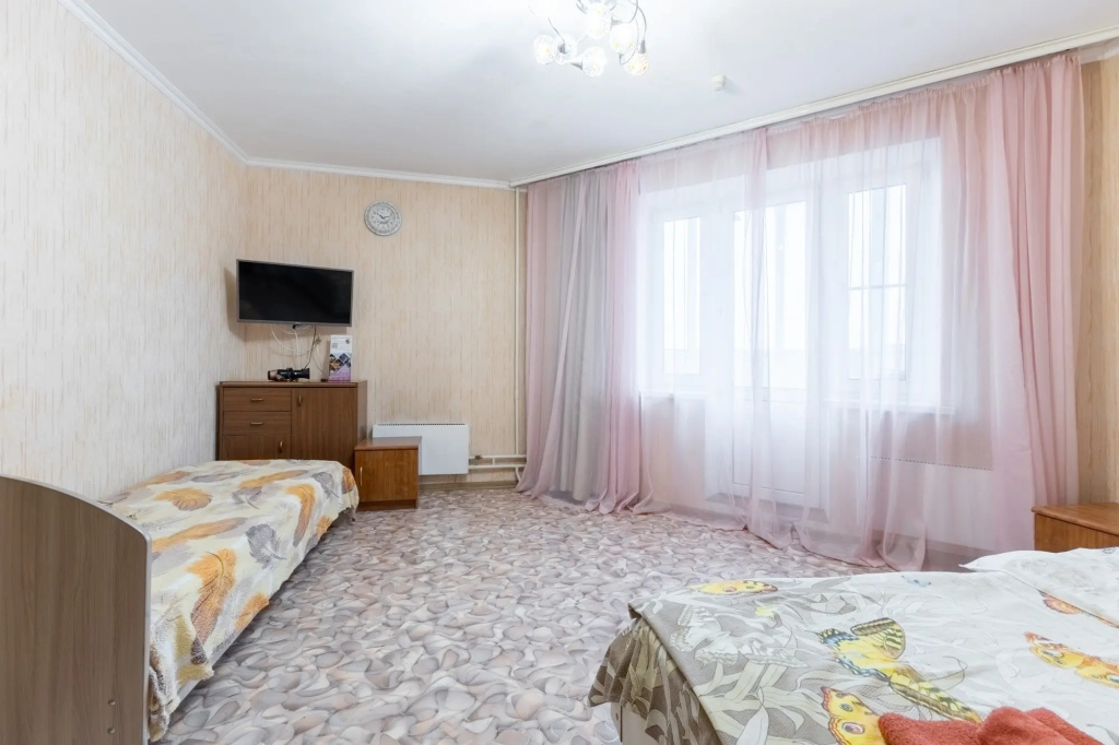 Отель Уютная квартира с розовыми шторами в Казани
