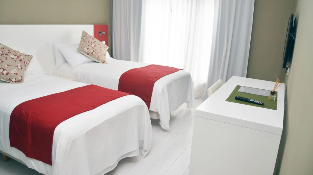 Magno Suites - Chambres