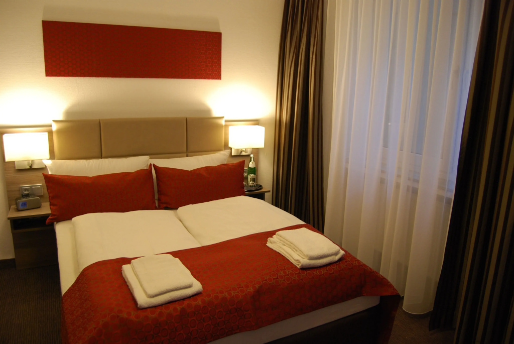 Dom Hotel Am Romerbrunnen - Chambres
