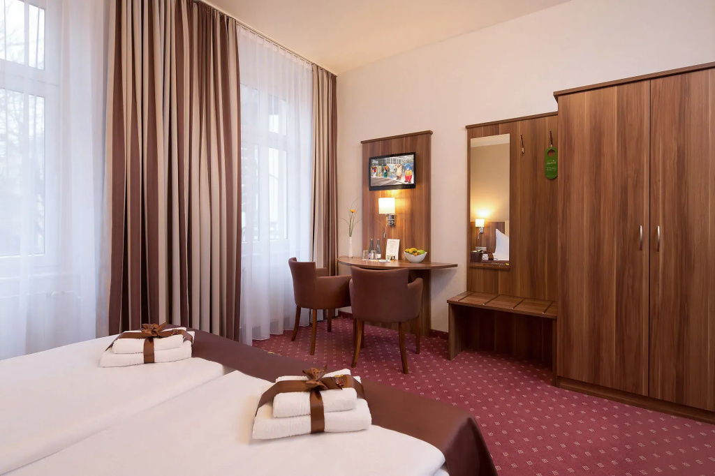 Gold Hotel - Chambres