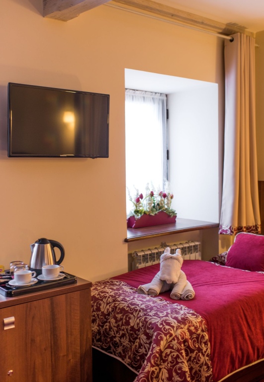 Standard Quadruple room (full double bed and twin beds)