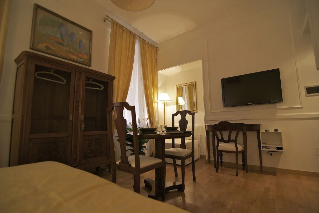Standard Triple room with garden view