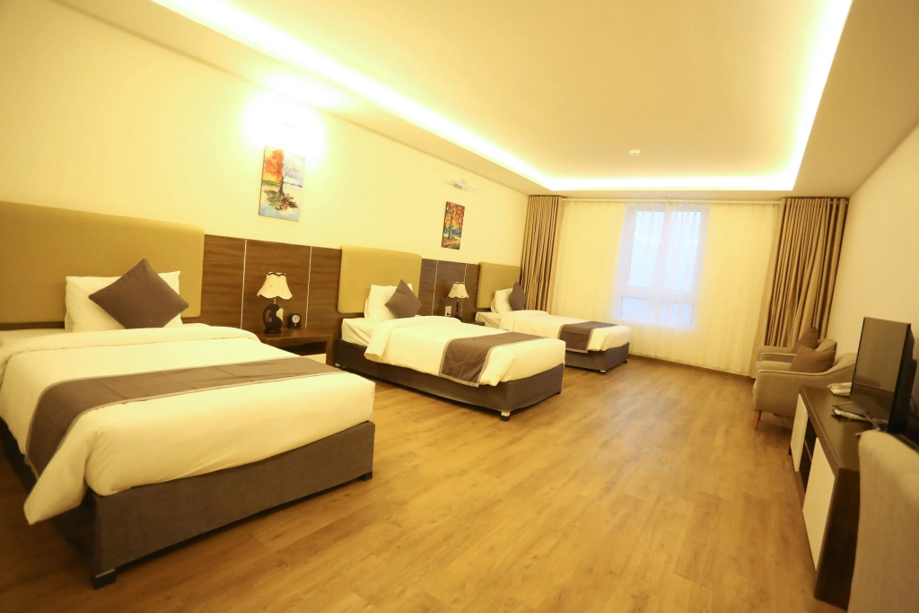 1 Bedroom Deluxe Triple room beachfront