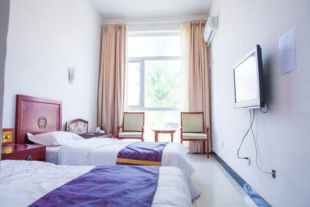 Yijie Holiday Hotel Shidu Jinmatai - Chambres