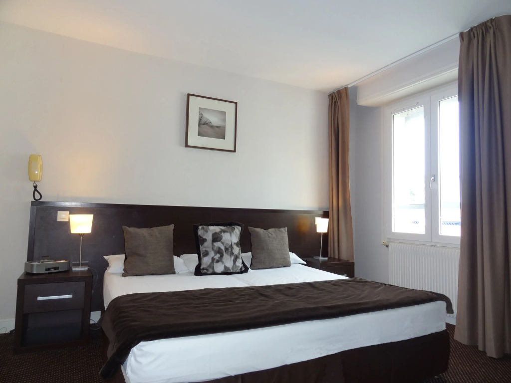 Standard Quadruple room with courtyard view