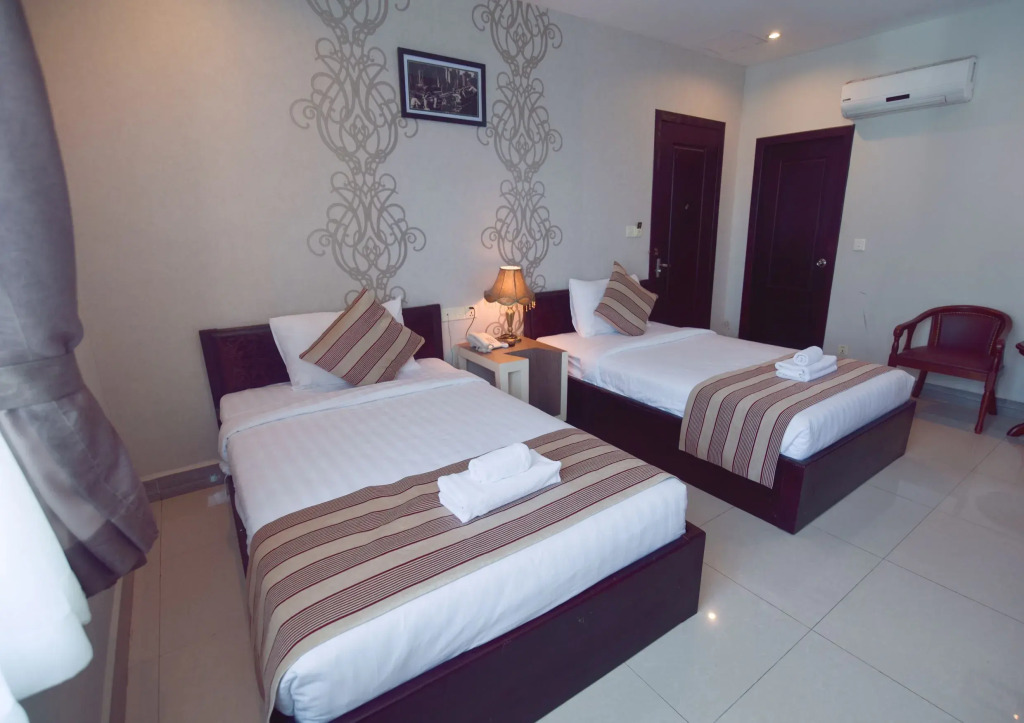 1 Bedroom Deluxe Double room with city view twin beds