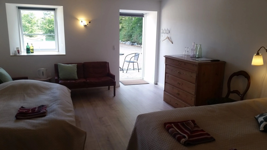 Deluxe Quadruple room with courtyard view
