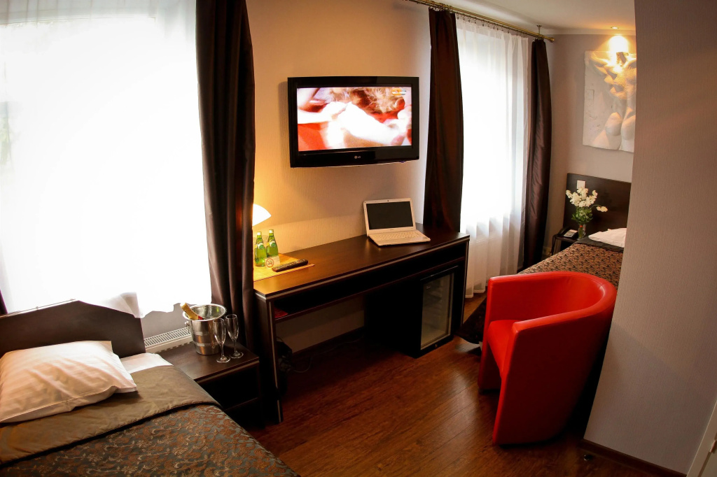 Primo Hotel - Chambres