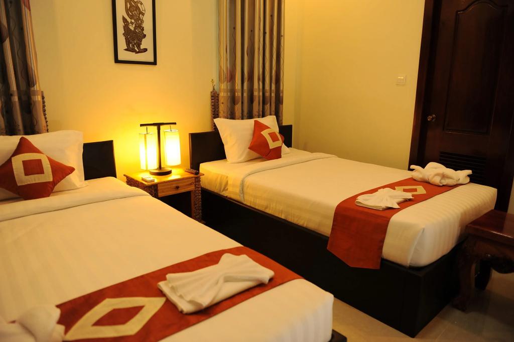 Relax Inn Boutique - Chambres