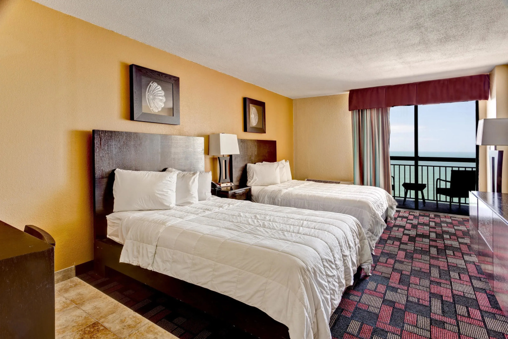 Standard Quadruple room with balcony and oceanfront