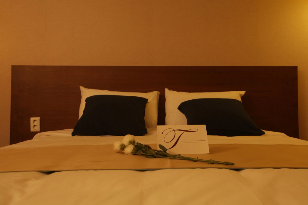 Yihua Hotel - Chambres