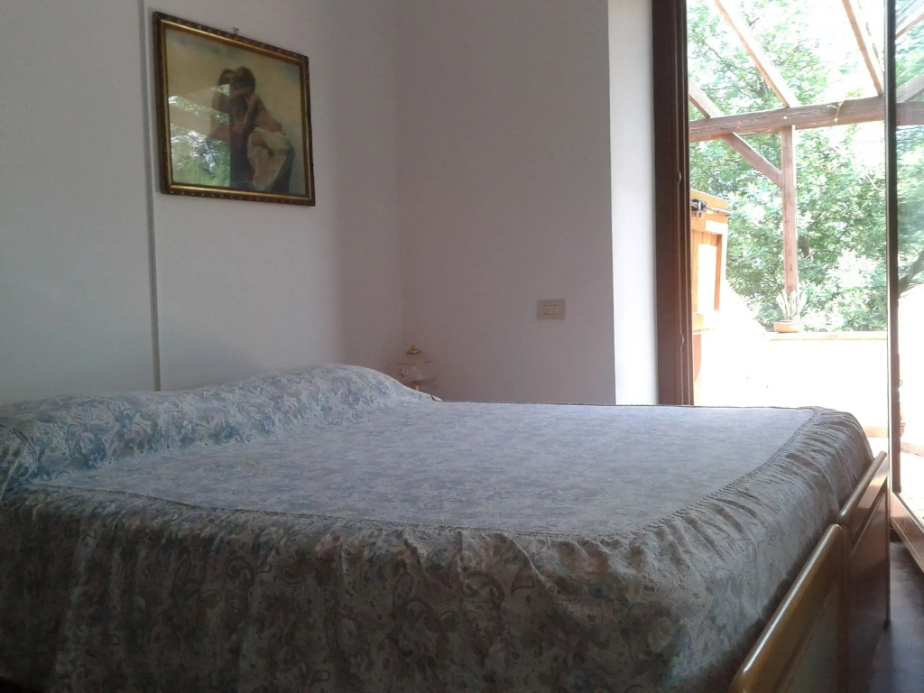 Standard Triple room with garden view