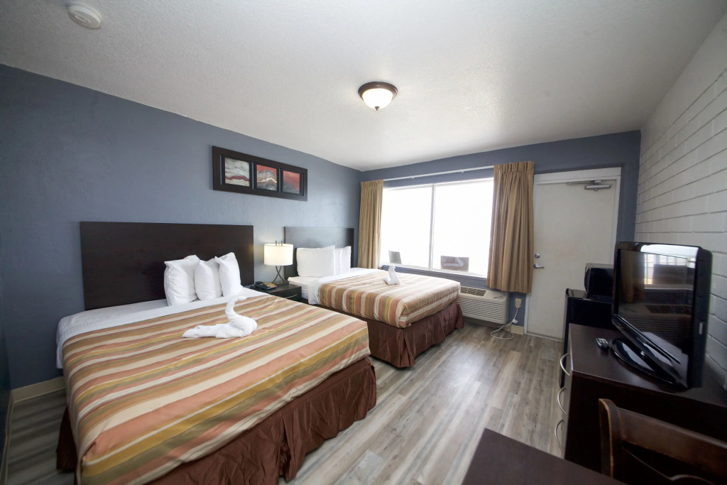 Standard Quadruple room with balcony and oceanfront