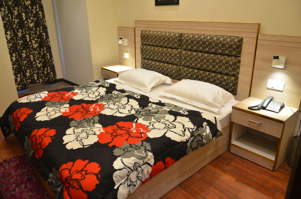 Superior Quadruple room with balcony and with city view