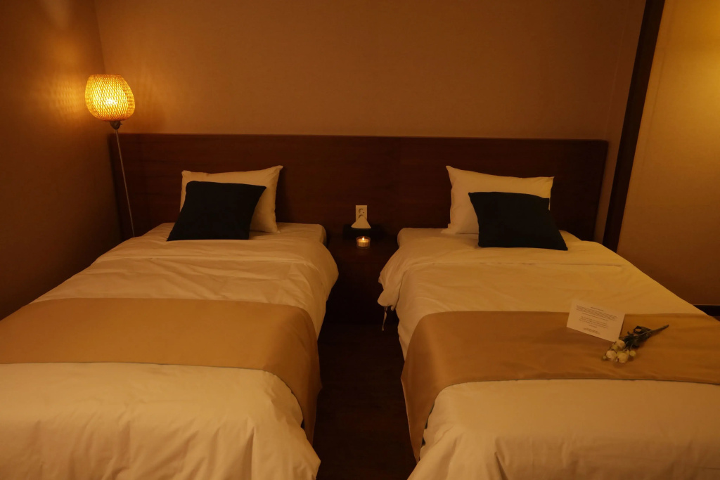 Yihua Hotel - Chambres