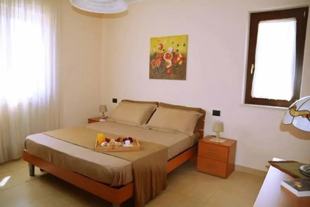 Standard Quadruple room with garden view