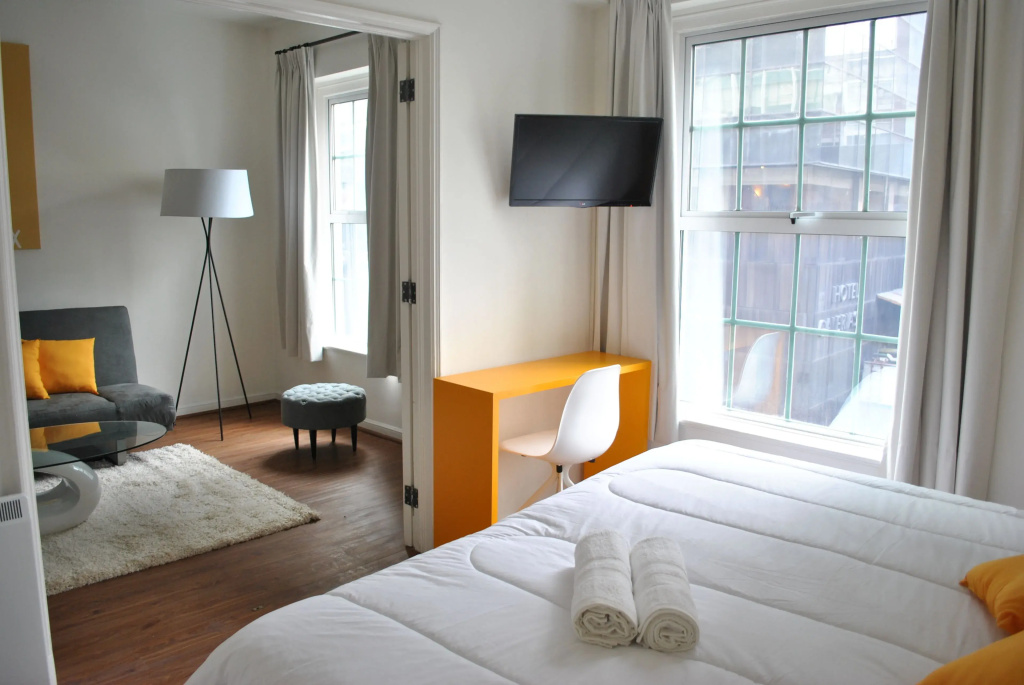 CLH Suites Santiago - Chambres