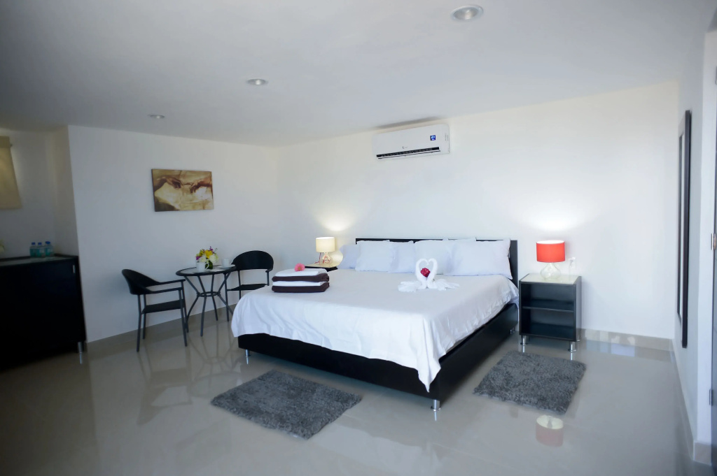 Sunrise 42 Suites Hotel - Chambres