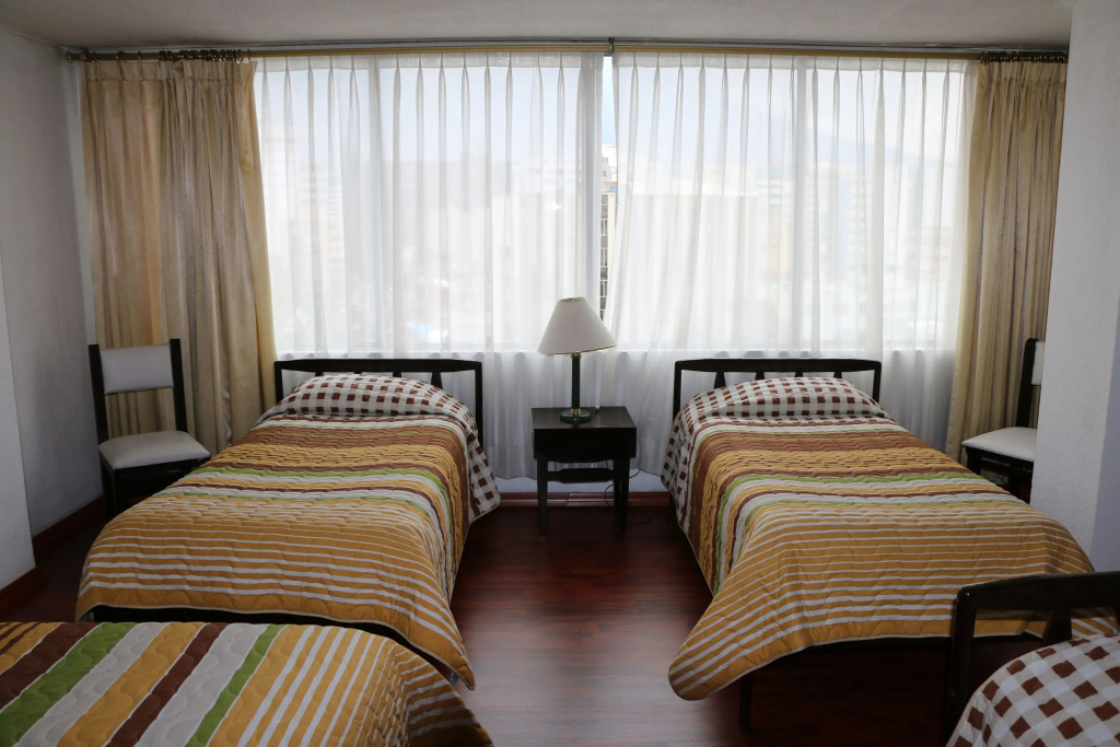 Hotel 6 de Diciembre - Chambres