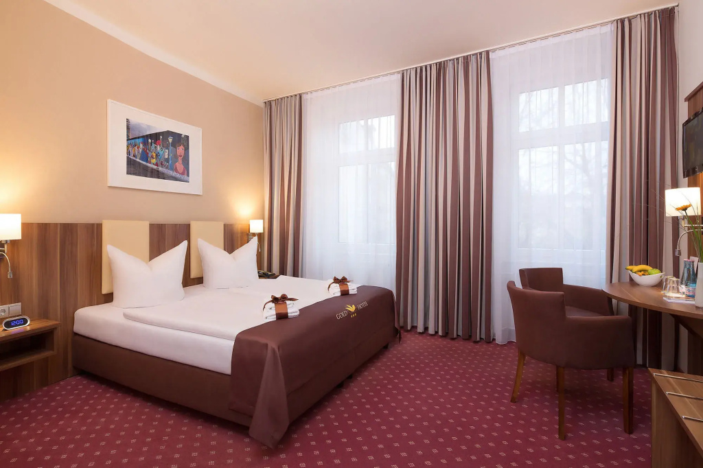 Gold Hotel - Chambres