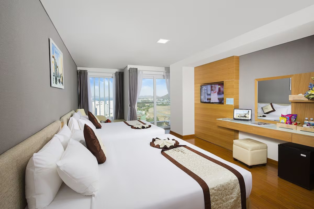 Family Quadruple room with balcony and with sea view