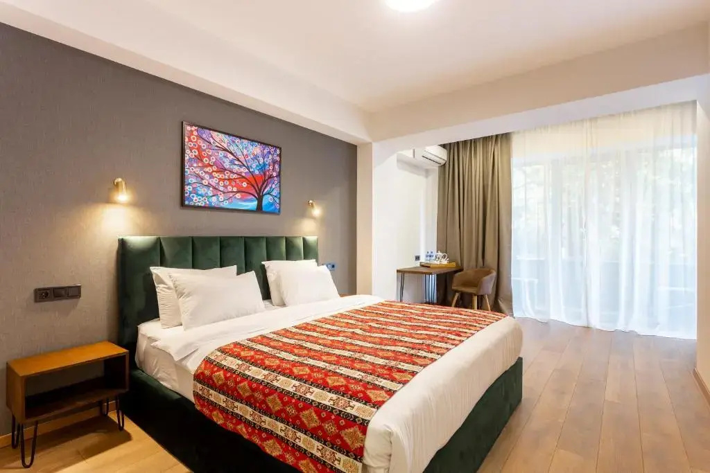 Double room with balcony (full double bed)