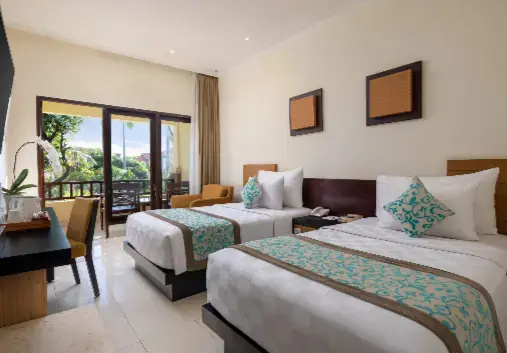 Adhi Jaya Hotel - Chambres