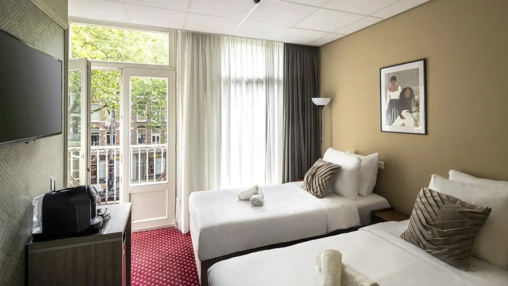 Double room with balcony (twin beds)