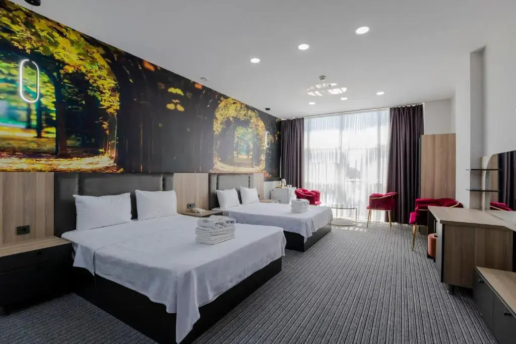 Deluxe Quadruple room with balcony and with view