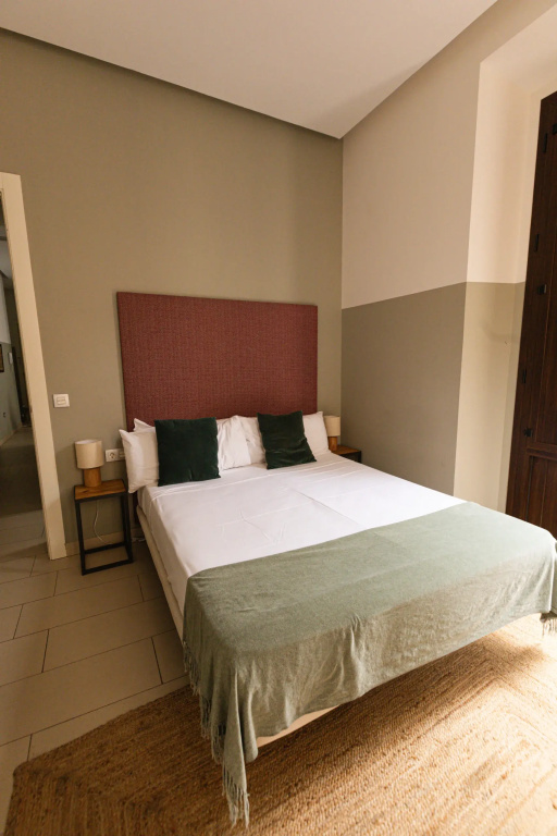Guzman El Bueno Suites - Chambres