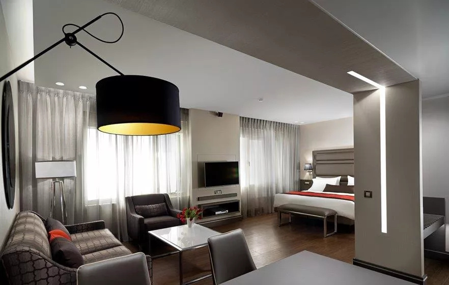 Holiday Suites - Chambres