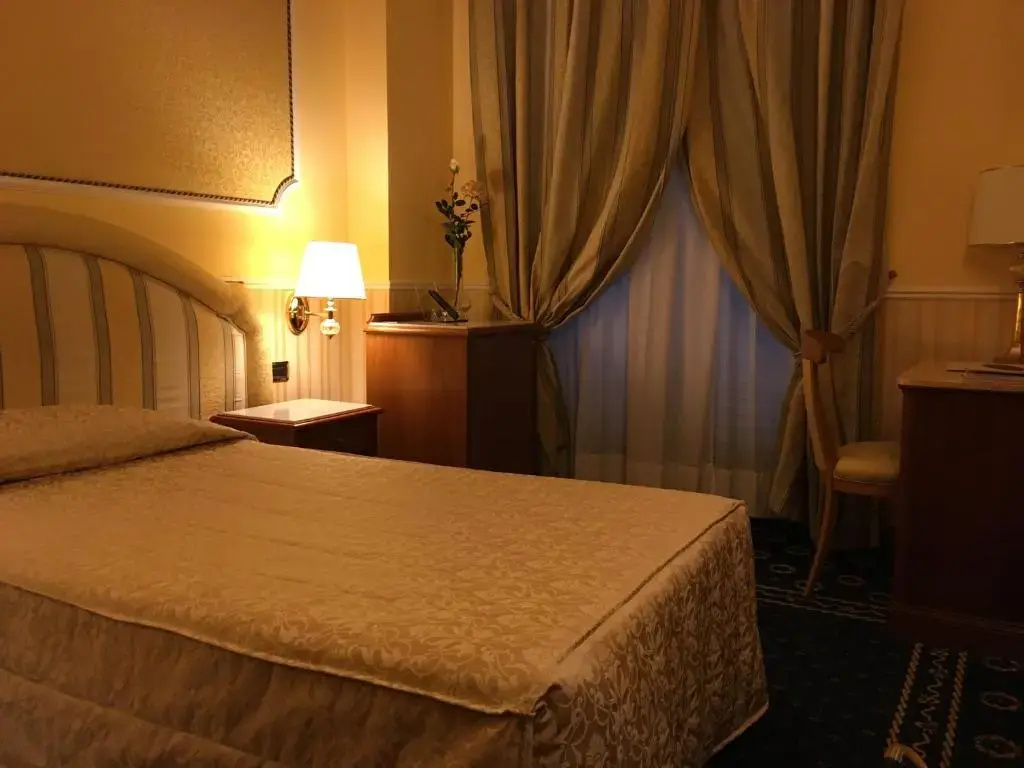 Andreola Central Hotel - Chambres