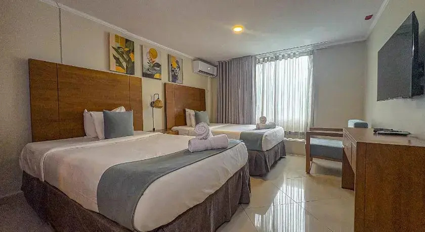Majestic City Suites & Beach Hotel - Chambres