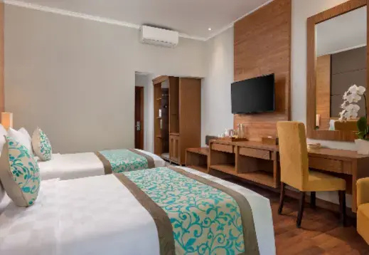 Adhi Jaya Hotel - Chambres