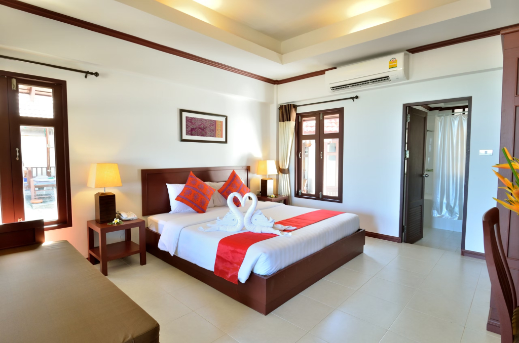 Двухместное бунгало Beachside двуспальная кровать в First Bungalow Beach Resort