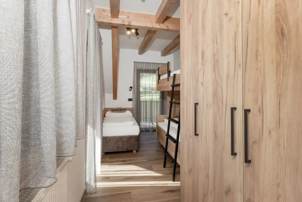 Aparthotel Familiaris - Family Apartments - Pools & Spa in the Dolomites - Chambres