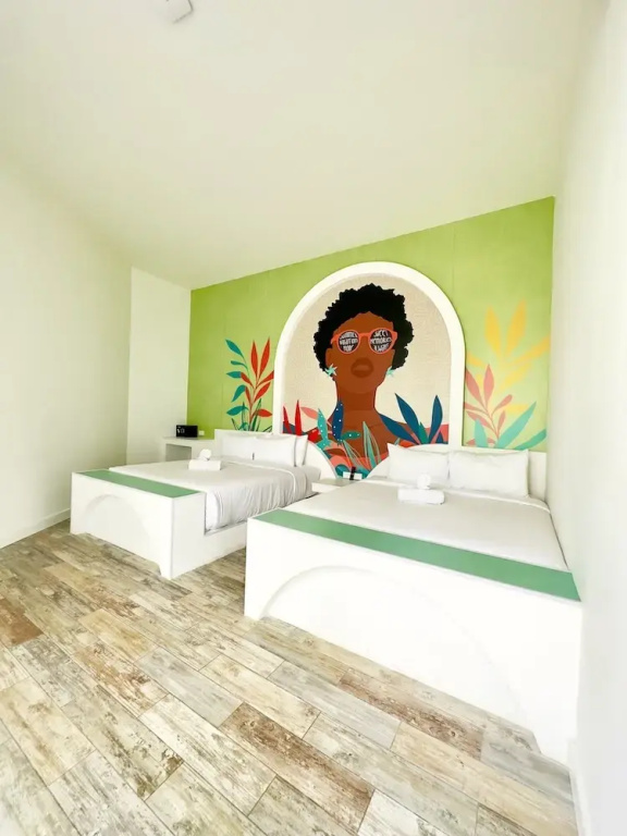 Teal & Coral Quadruple room