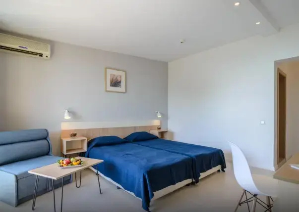 Sunrise Hotel - Chambres