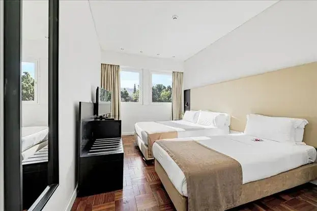Lisboa Central Park Hotel Suites & Studios - Chambres