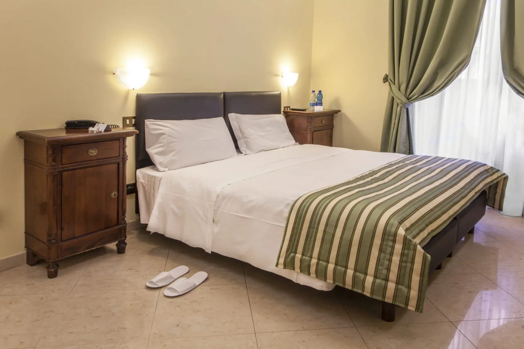 Hotel Regina Giovanna - Tap to explore photos