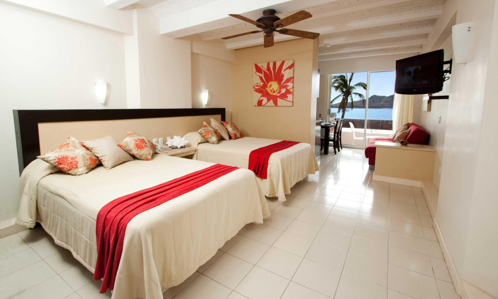 Quadruple Junior Suite with balcony and with sea view