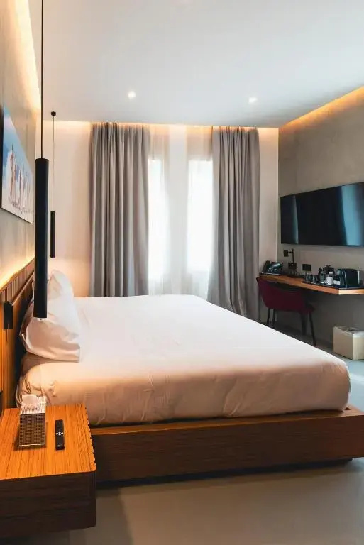 J Maluni City Hotel - Chambres
