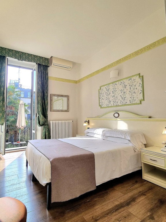 Superior Double room with balcony and with garden view (full double bed)