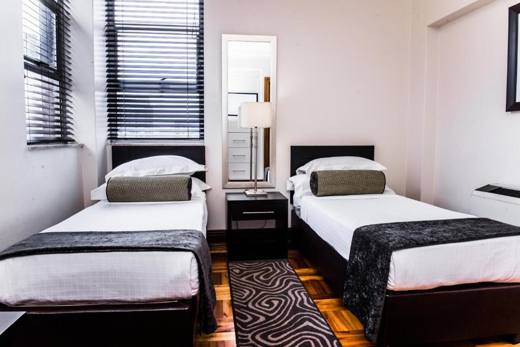 Belaire Suites - Chambres